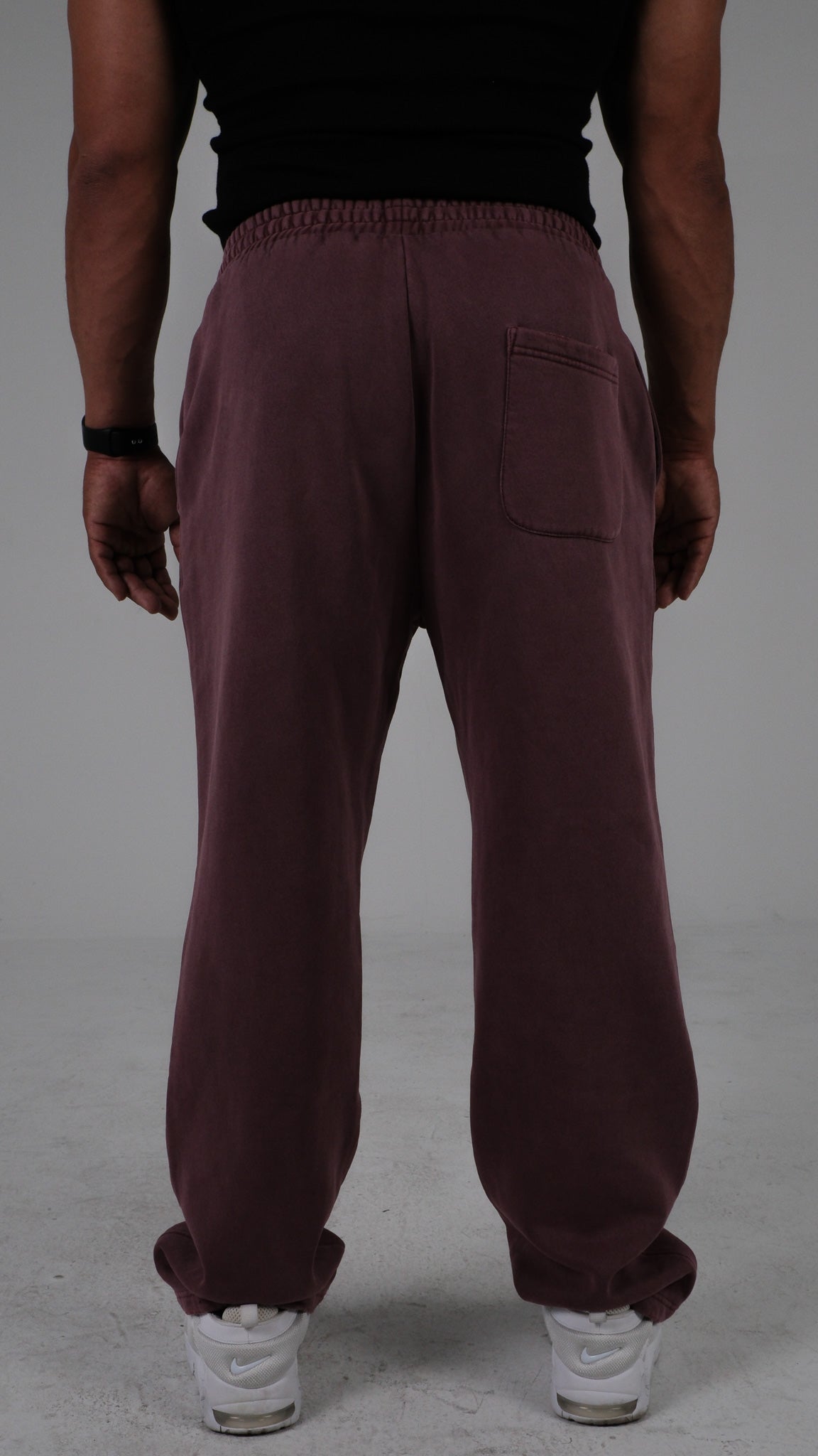 DL: ESSENTIALS 03 FRAYED ENZYME WASHED WIDE LEG SWEATS IN MAROON